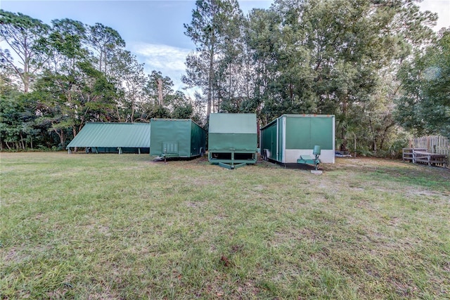 view of yard with a storage shed