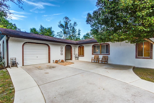 ranch-style home with a garage