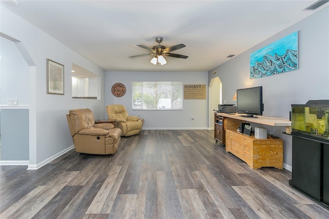 sitting room with ceiling fan and dark hardwood / wood-style floors