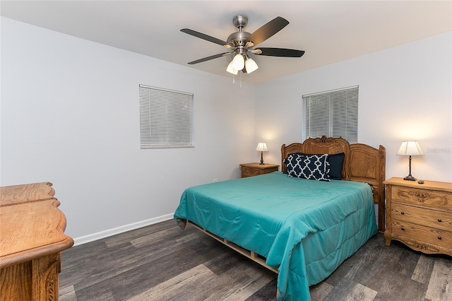 bedroom featuring ceiling fan and dark hardwood / wood-style flooring