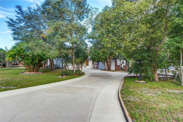 exterior space featuring a front lawn