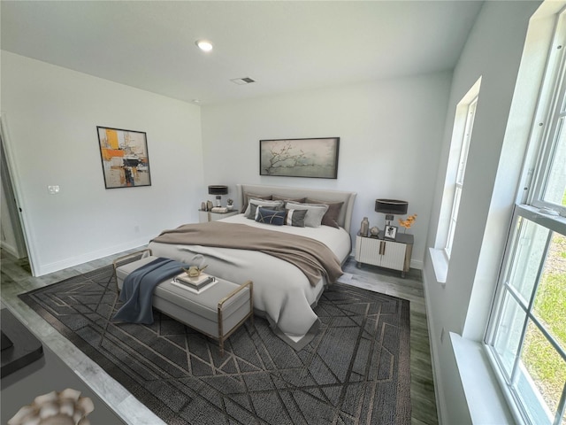 bedroom with wood-type flooring