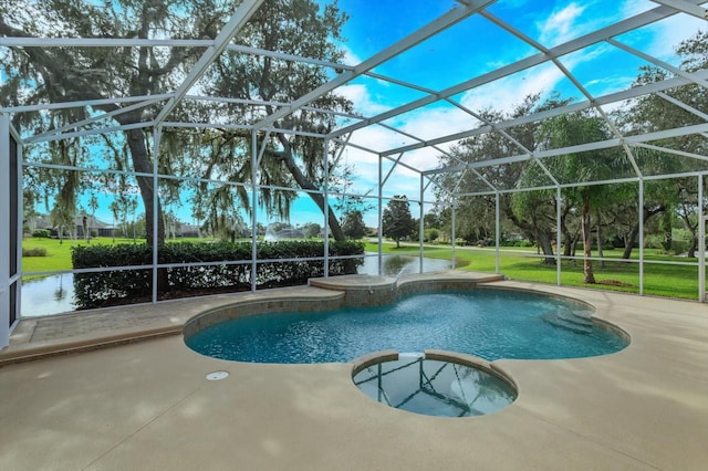 view of pool with glass enclosure, a yard, and a patio