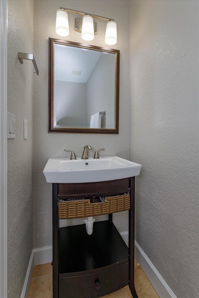 bathroom featuring sink and tile patterned floors