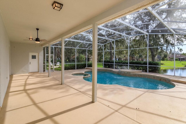 view of pool featuring ceiling fan, a lanai, a patio, and a water view