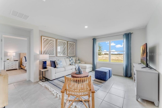 living room with light tile patterned floors