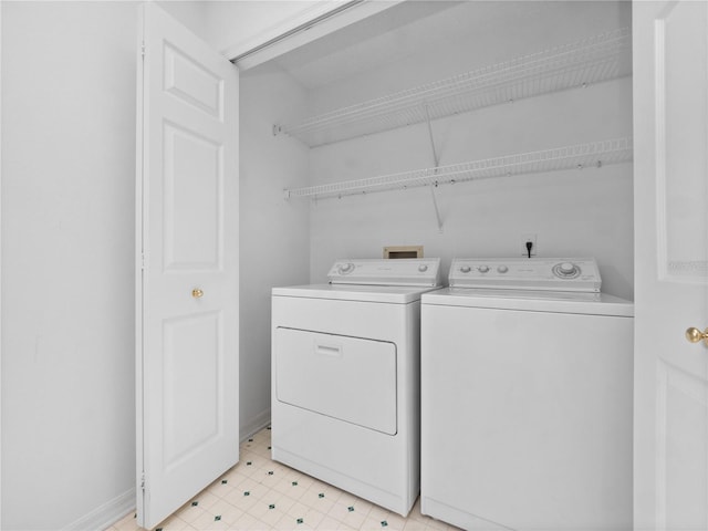 laundry area with washer and clothes dryer