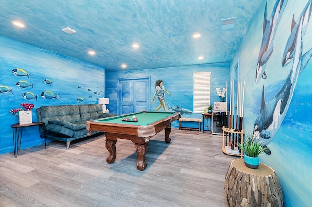 game room featuring light wood-type flooring and billiards