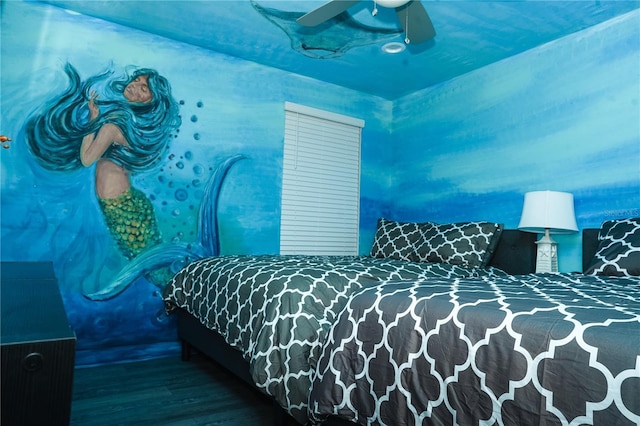 bedroom featuring ceiling fan and wood-type flooring