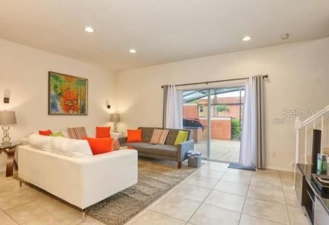 living room featuring light tile patterned floors