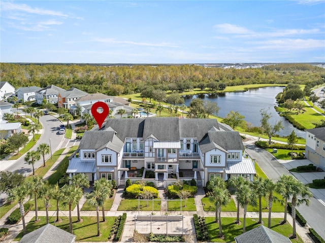 drone / aerial view with a water view