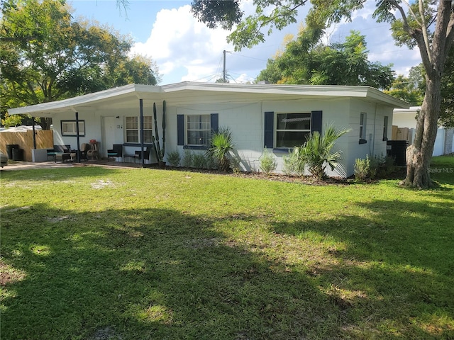 view of front facade featuring a front lawn and a porch