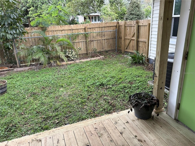 view of yard with a wooden deck