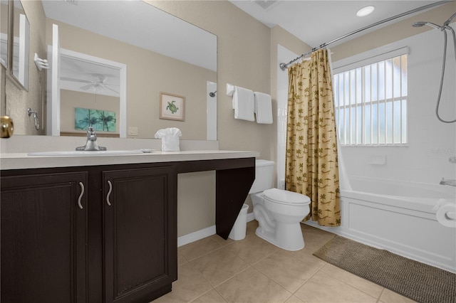 full bathroom featuring shower / bath combo, vanity, tile patterned flooring, ceiling fan, and toilet