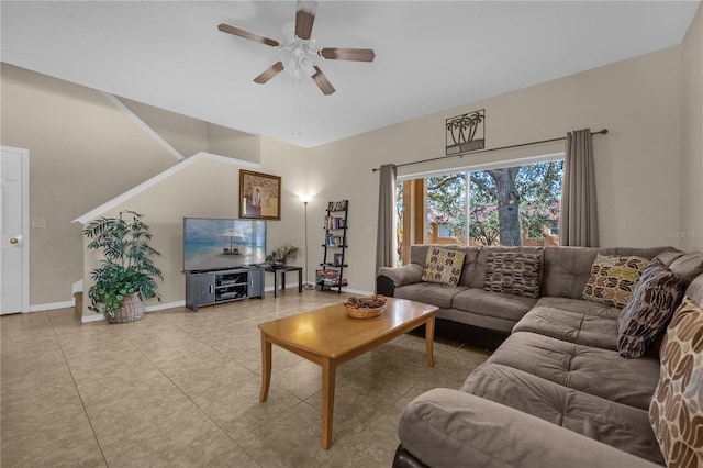 living room featuring ceiling fan and light tile patterned flooring