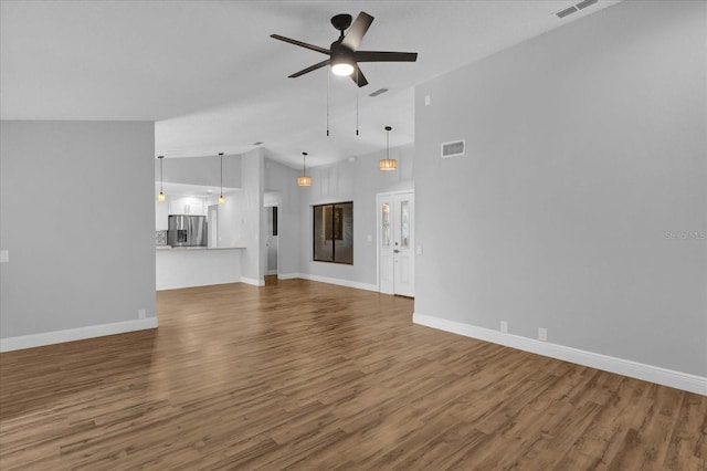 unfurnished living room featuring ceiling fan, high vaulted ceiling, and hardwood / wood-style flooring