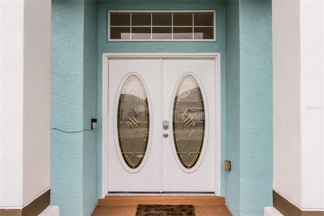 doorway to property with washer and dryer