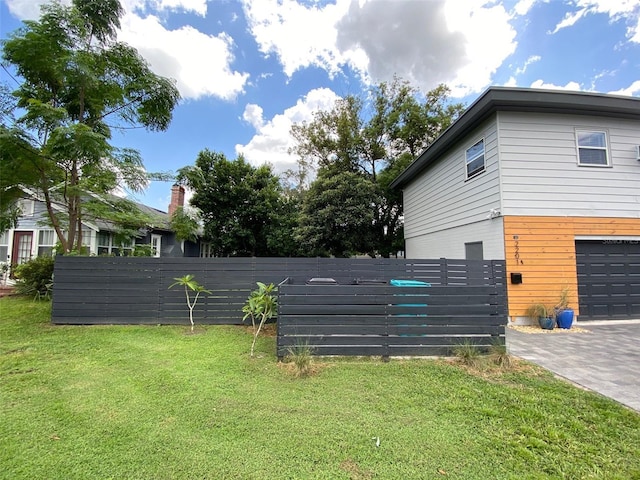 view of yard with a garage