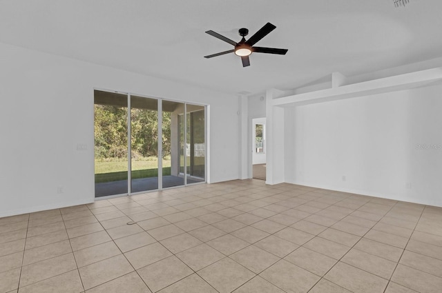 unfurnished room featuring ceiling fan and light tile patterned floors