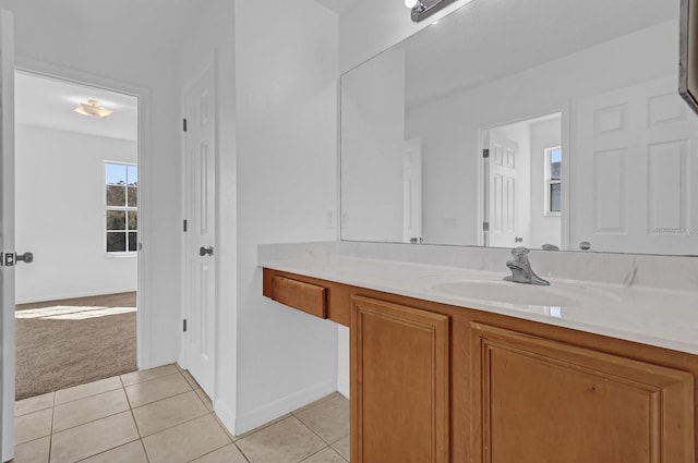 bathroom with tile patterned flooring and vanity