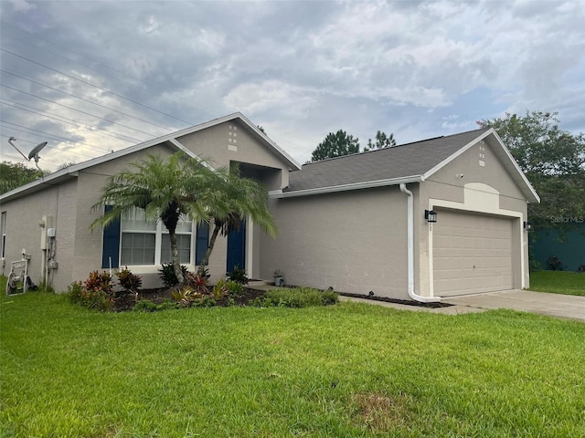 single story home with a garage and a front yard