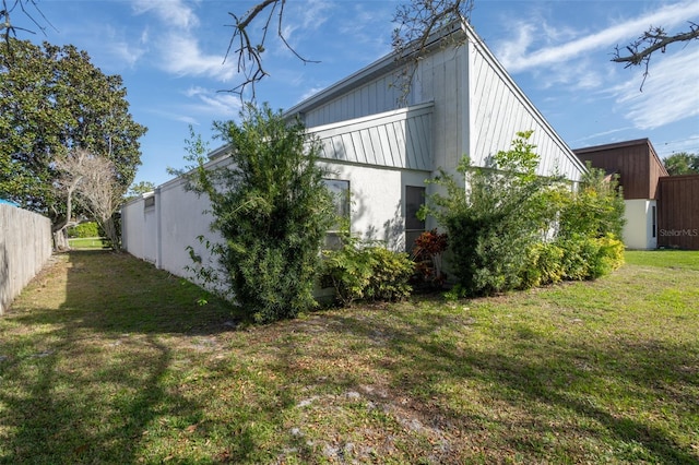 exterior space with a lawn