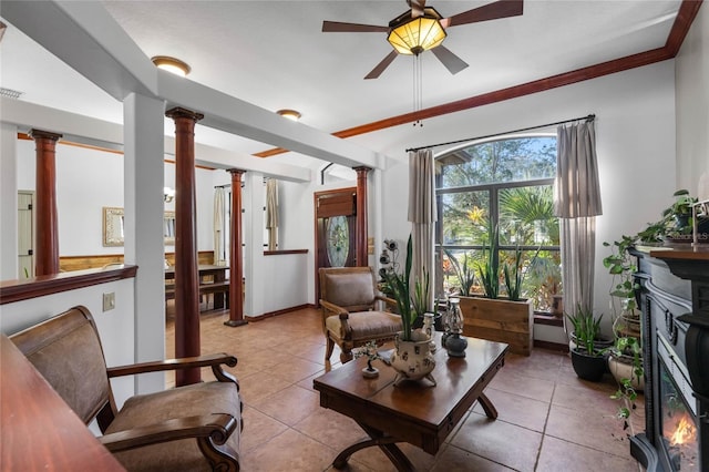 1562 Anorada Blvd, Kissimmee, FL 34744 - living area featuring ornate columns, ceiling fan, and light tile patterned floors