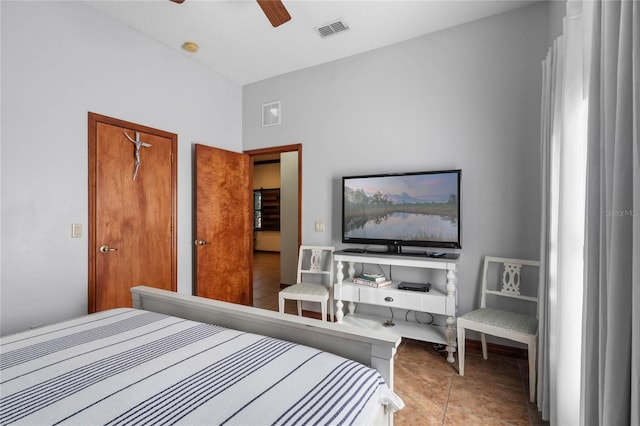 bedroom featuring ceiling fan and light tile patterned floors