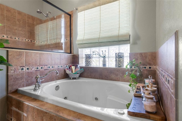 bathroom featuring separate shower and tub