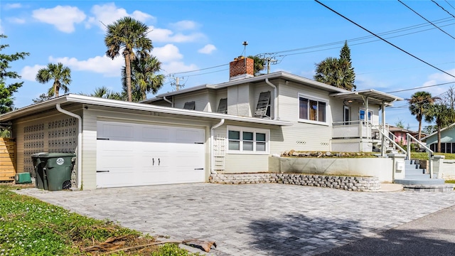 front facade with a garage