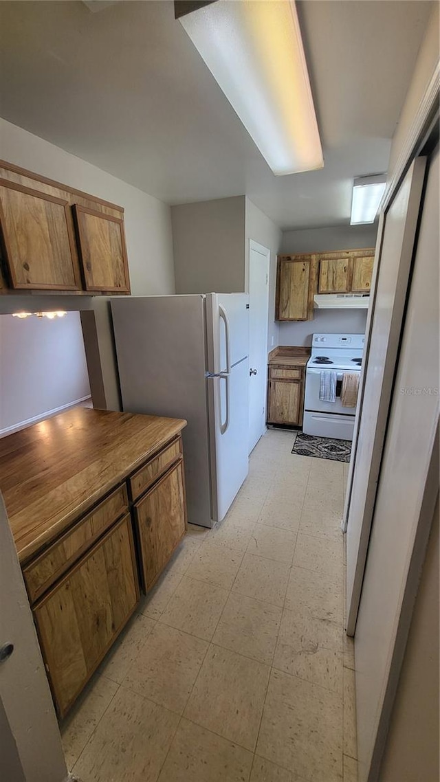 kitchen featuring white appliances