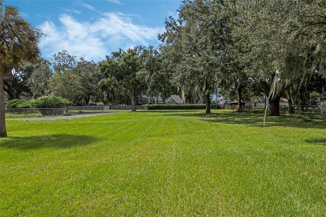 surrounding community with a lawn