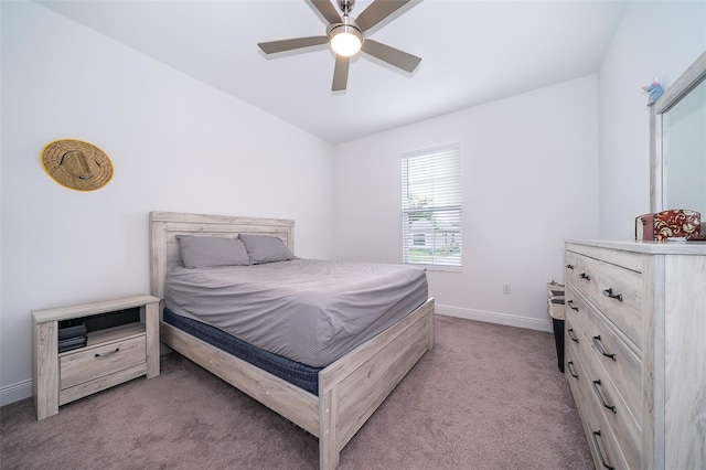 bedroom with light carpet and ceiling fan