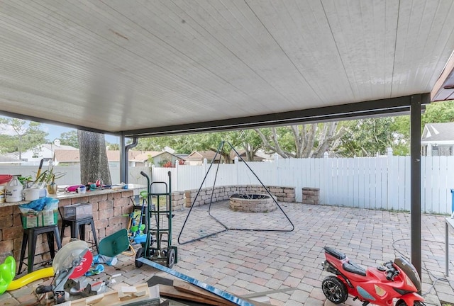 view of patio / terrace featuring an outdoor bar