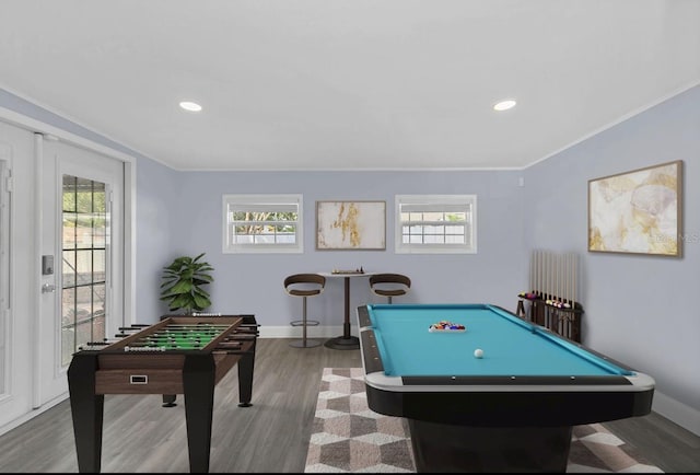 game room with hardwood / wood-style flooring, billiards, crown molding, and a wealth of natural light