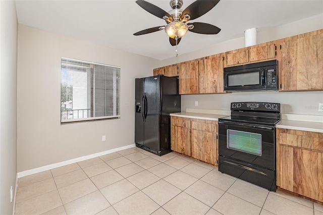 kitchen with black appliances, light tile patterned floors, and ceiling fan