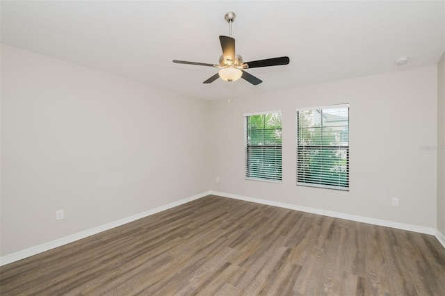 unfurnished room featuring hardwood / wood-style floors and ceiling fan