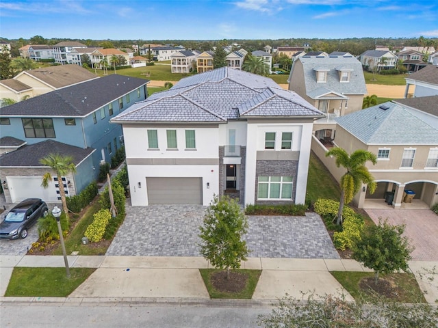 view of front of property with a garage