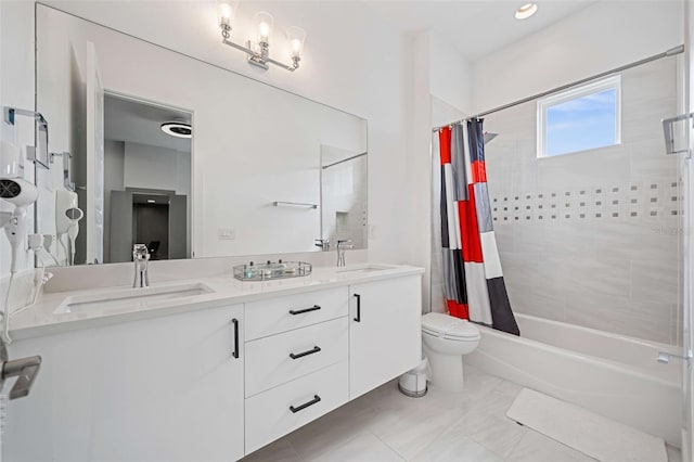 full bathroom featuring vanity, toilet, and shower / tub combo