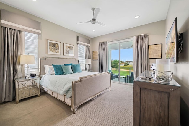 carpeted bedroom featuring access to outside and ceiling fan