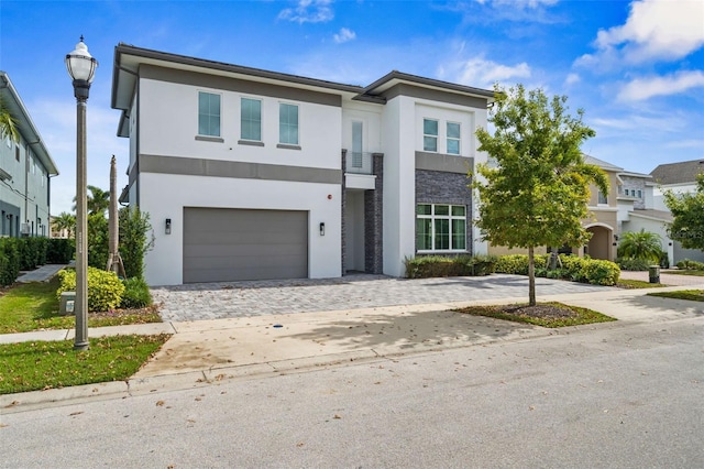 view of front of property with a garage