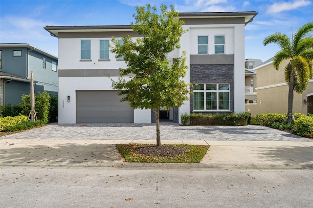 modern home featuring a garage