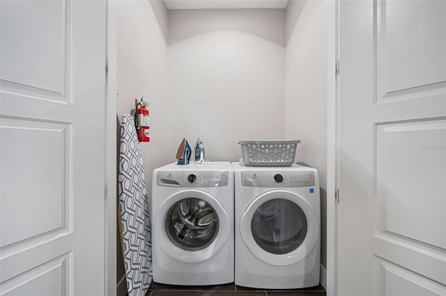 laundry room featuring washing machine and dryer