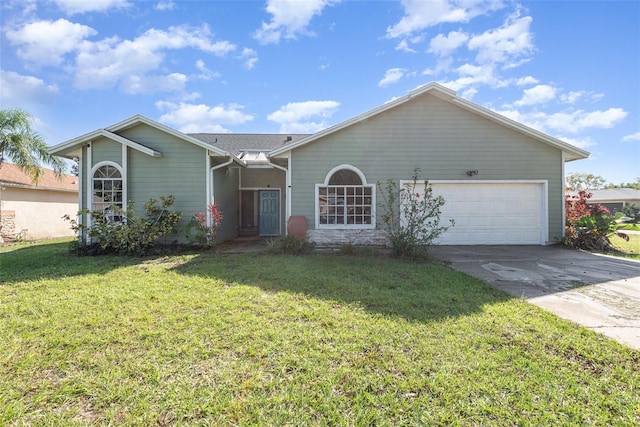 ranch-style house featuring a garage and a front yard