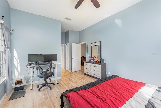 bedroom featuring ceiling fan and light hardwood / wood-style flooring