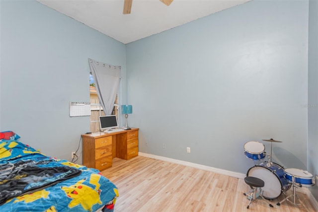 bedroom featuring ceiling fan and light hardwood / wood-style flooring