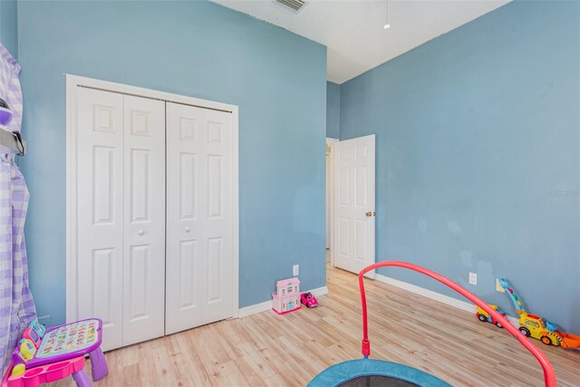 playroom with light wood-type flooring