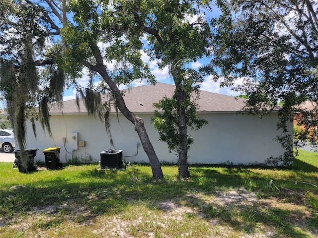 view of property exterior featuring central AC