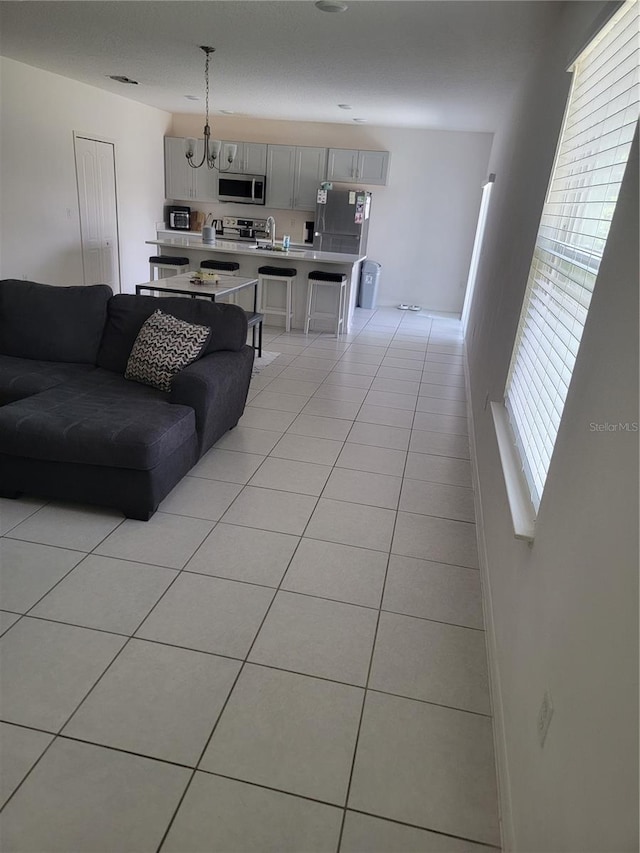 tiled living room with sink