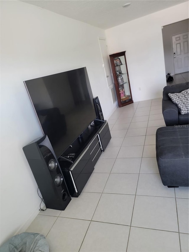 living room with light tile patterned floors